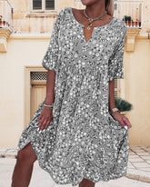 DAISY | Midi dress with floral pattern-1