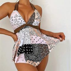 https://cdn.shopify.com/s/files/1/0884/1668/2333/files/Sommer-zweiteilige-Badeanz-ge-Frau-Vintage-Print-Bade-bekleidung-weibliche-Tankini-setzt-tief-v-Strand-tragen_861c2629-4592-43a6-a175-35d1bf475447.webp?v=1739861253