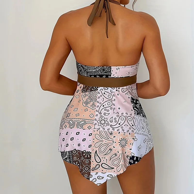 https://cdn.shopify.com/s/files/1/0884/1668/2333/files/Sommer-zweiteilige-Badeanz-ge-Frau-Vintage-Print-Bade-bekleidung-weibliche-Tankini-setzt-tief-v-Strand-tragen_d53e3ef7-c6ee-4ca6-946a-b12c66eadd1c.webp?v=1739861253