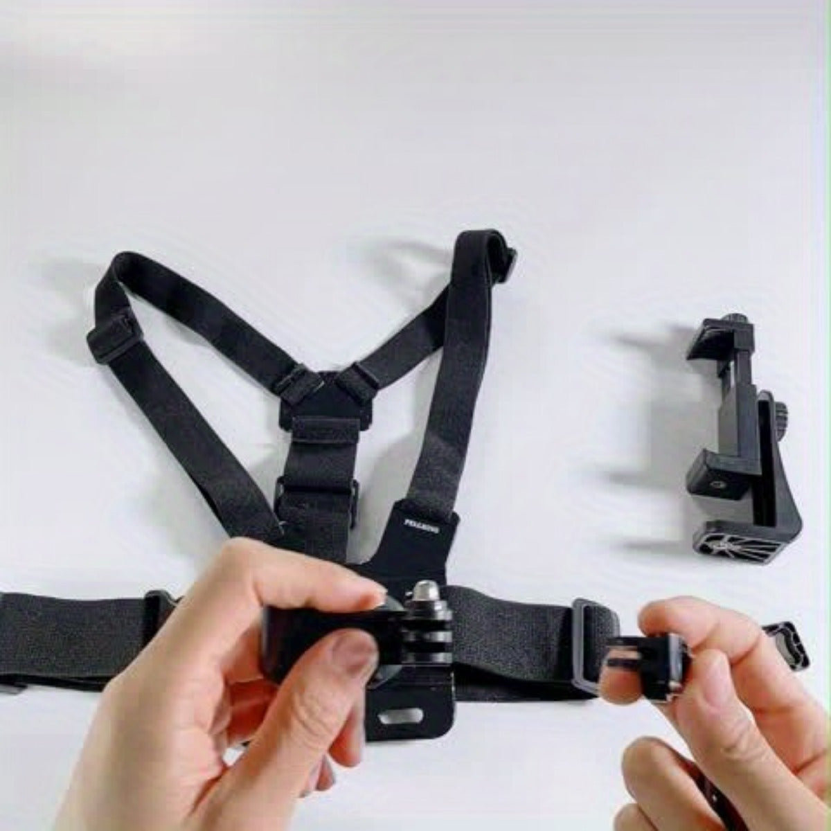 Adjustable vertical belt for comfortable filming and photography-safe telephone holder for smartphones and action cameras 4