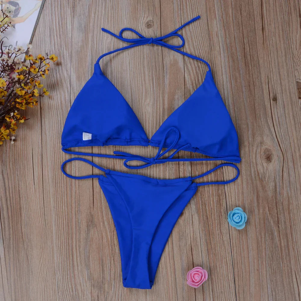 https://cdn.shopify.com/s/files/1/0884/1668/2333/files/Women-Bikini-Set-Sexy-Side-Tie-Thong-Swimsuit-Bandage-Style-Brazilian-Swimwear-Ultrathin-Bra-Brief-Sets_2b67df6f-e6d4-47fd-a85c-2fab2e74c661.webp?v=1734868922
