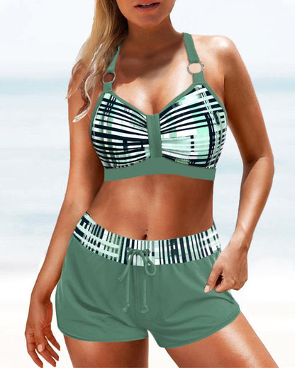 https://cdn.shopify.com/s/files/1/0884/1668/2333/files/bikini-met-hoge-taille-broekje-en-streepjesprint-or-dona-bikini-carla-moda-1_86c7e07f-2f16-42c8-85b4-8c770af8bb2e.jpg?v=1734868907