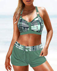 https://cdn.shopify.com/s/files/1/0884/1668/2333/files/bikini-met-hoge-taille-broekje-en-streepjesprint-or-dona-bikini-carla-moda-1.jpg?v=1734868905